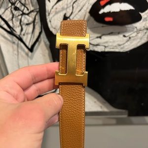 Authentic Hermes belt buckle with reversible Hermes.
